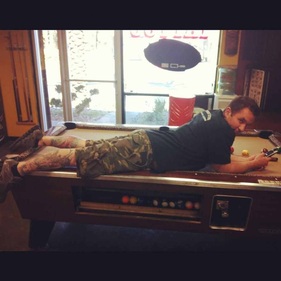 Master Body Piercing and Mofidication Artist Tony Snow Hard at Work at Voodoo Tattoo
